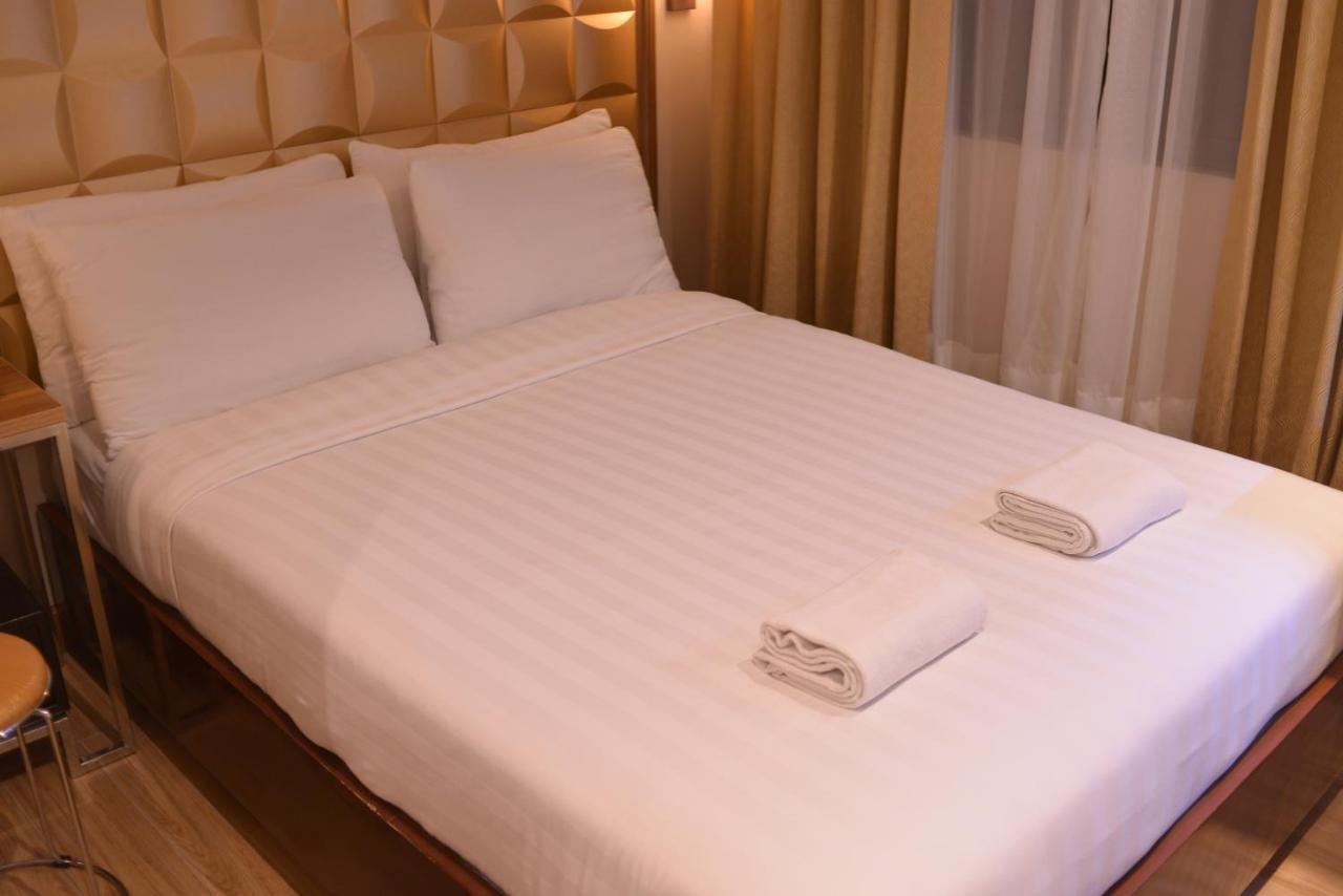 Robertson Hotel Naga  Pokoj fotografie