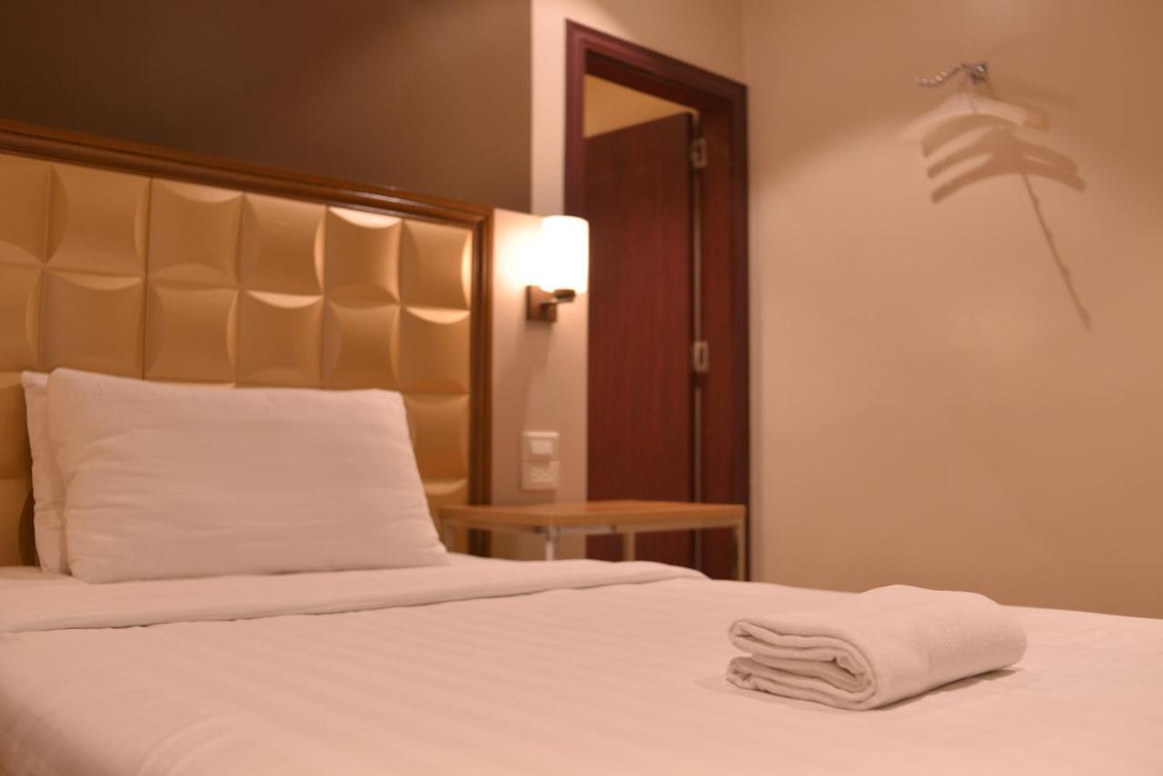 Robertson Hotel Naga  Pokoj fotografie