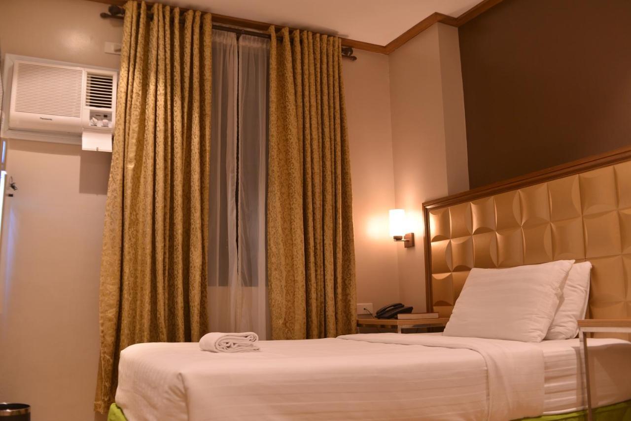 Robertson Hotel Naga  Pokoj fotografie